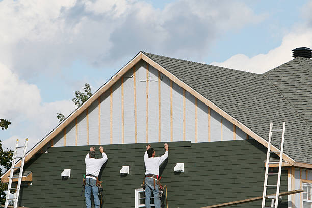 Professional Siding technician working in National Park, NJ